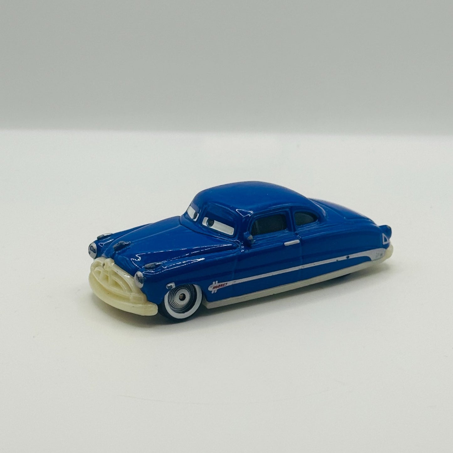 Disney Pixar Cars - DOC HUDSON *UNPAINTED CHASSIS BUMPER* Error - 1:55 Diecast
