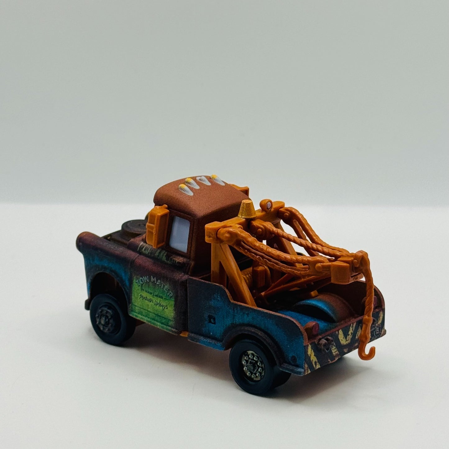 Disney Pixar Cars - EXCITED ROAD TRIP MATER RAISED FRONT - 1:55 Diecast *NEW*