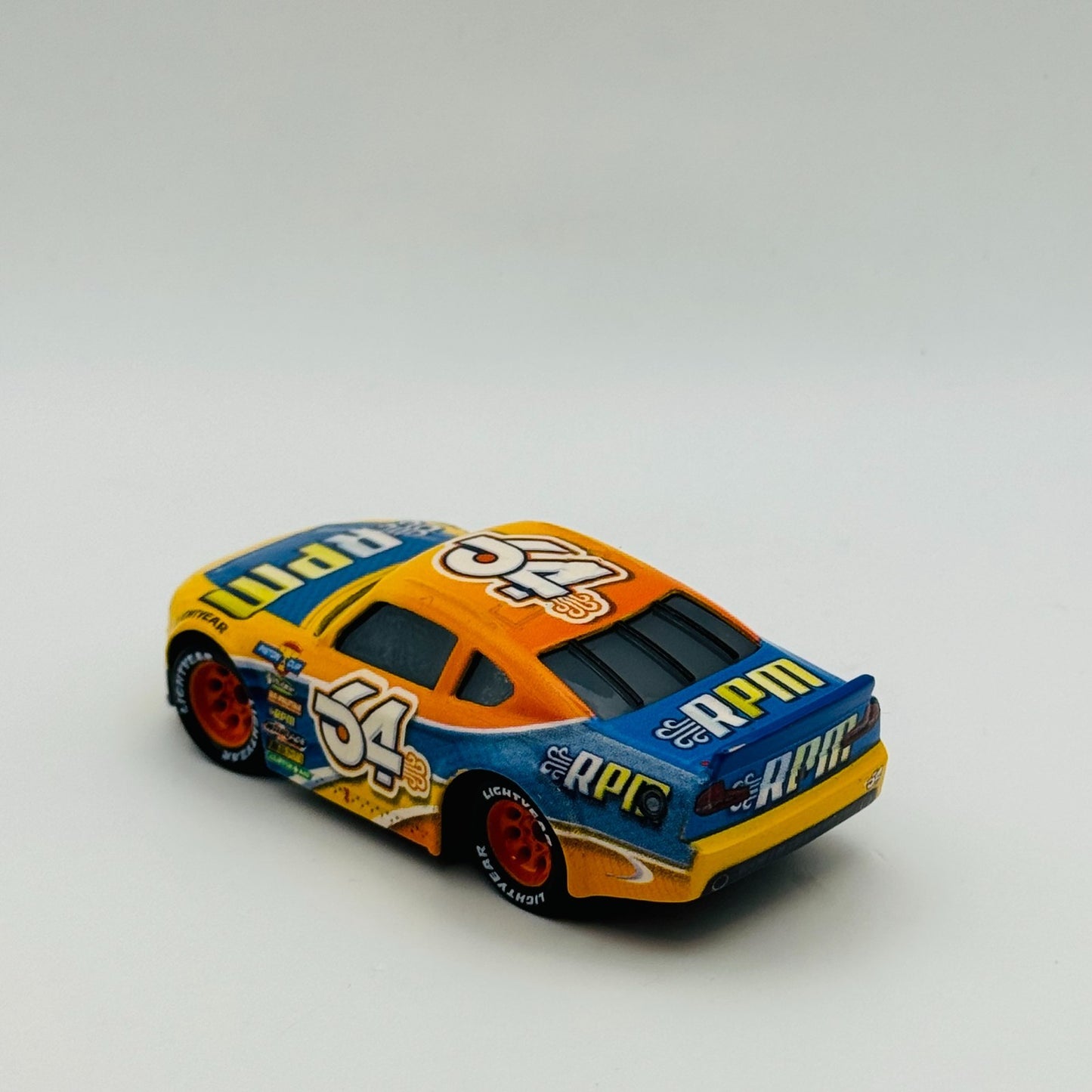 Disney Pixar Cars - BRUCE MILLER RPM Veteran 2022- 1:55 Diecast *NEW OUT OF BOX*