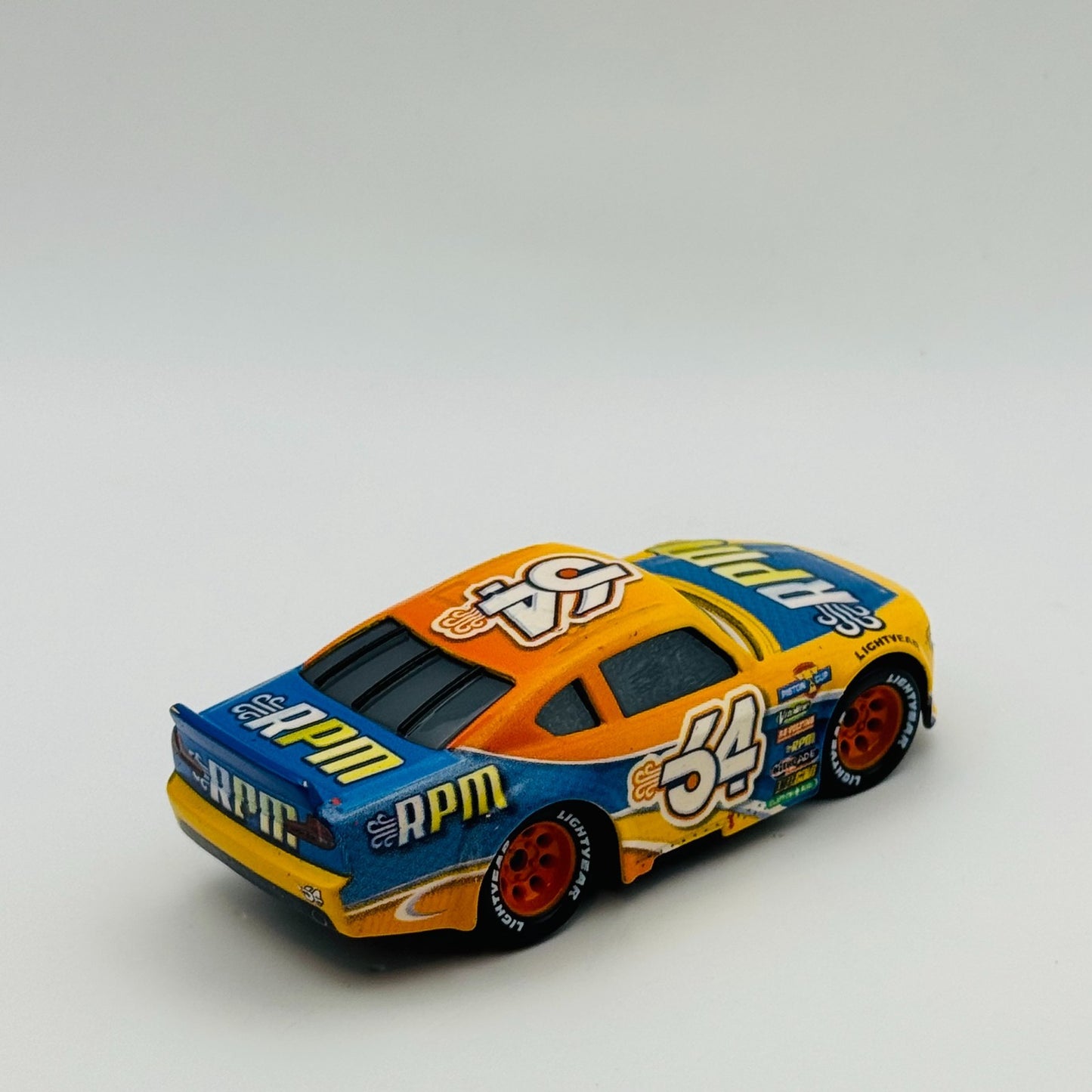 Disney Pixar Cars - BRUCE MILLER RPM Veteran 2022- 1:55 Diecast *NEW OUT OF BOX*