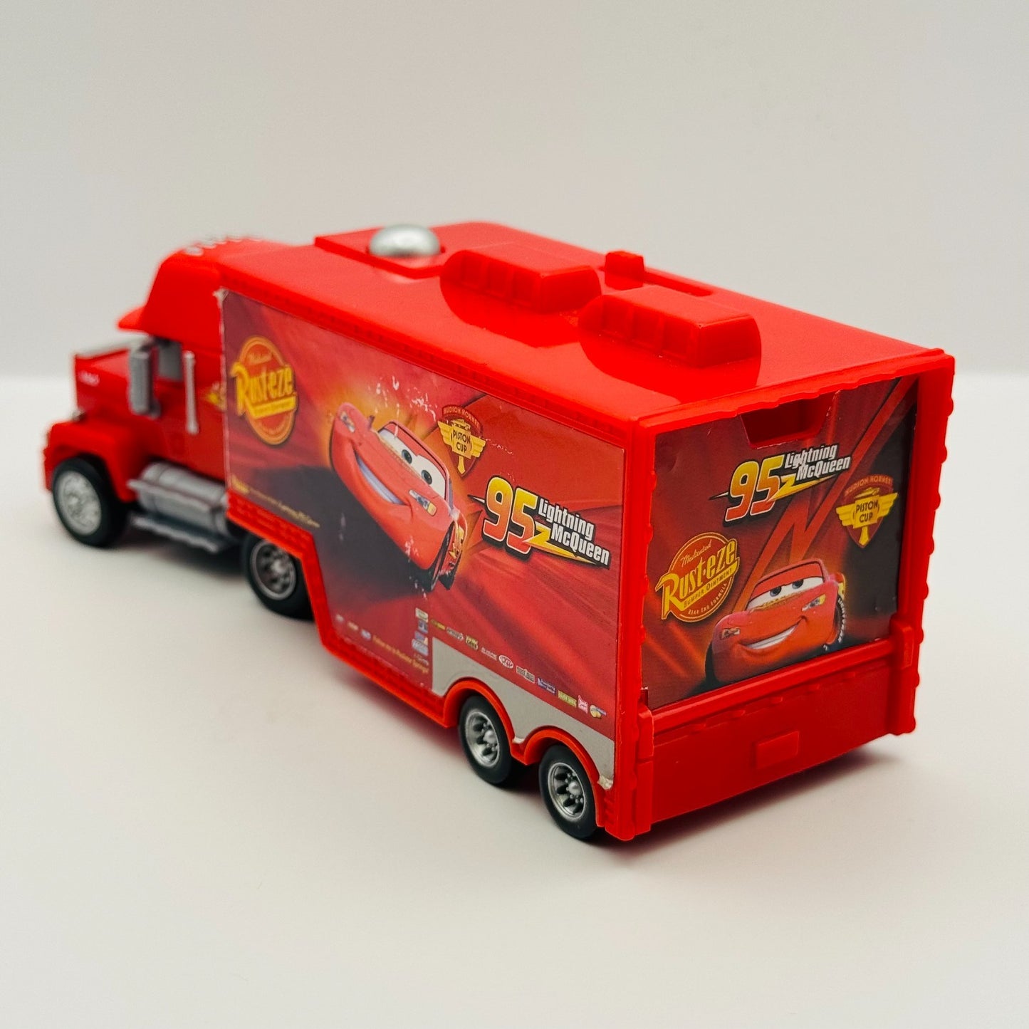 Disney Pixar Cars - QUICK CHANGERS DELUXE MACK TRANSPORTER CARS 2 - 1:55 Scale