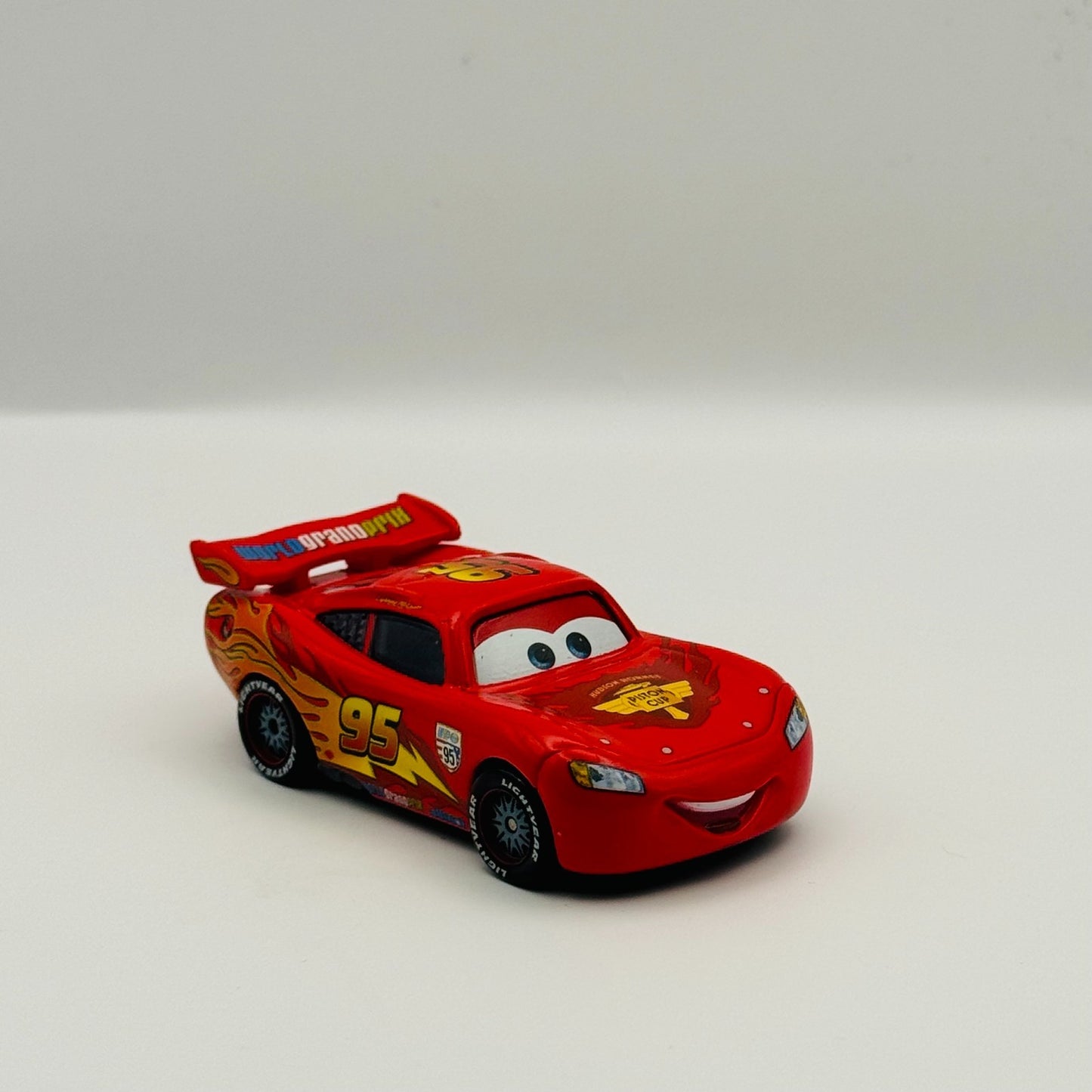 Disney Pixar Cars - PIT STOP LAUNCHERS WGP MQQUEEN VARIANT 2011 - 1:55 Diecast