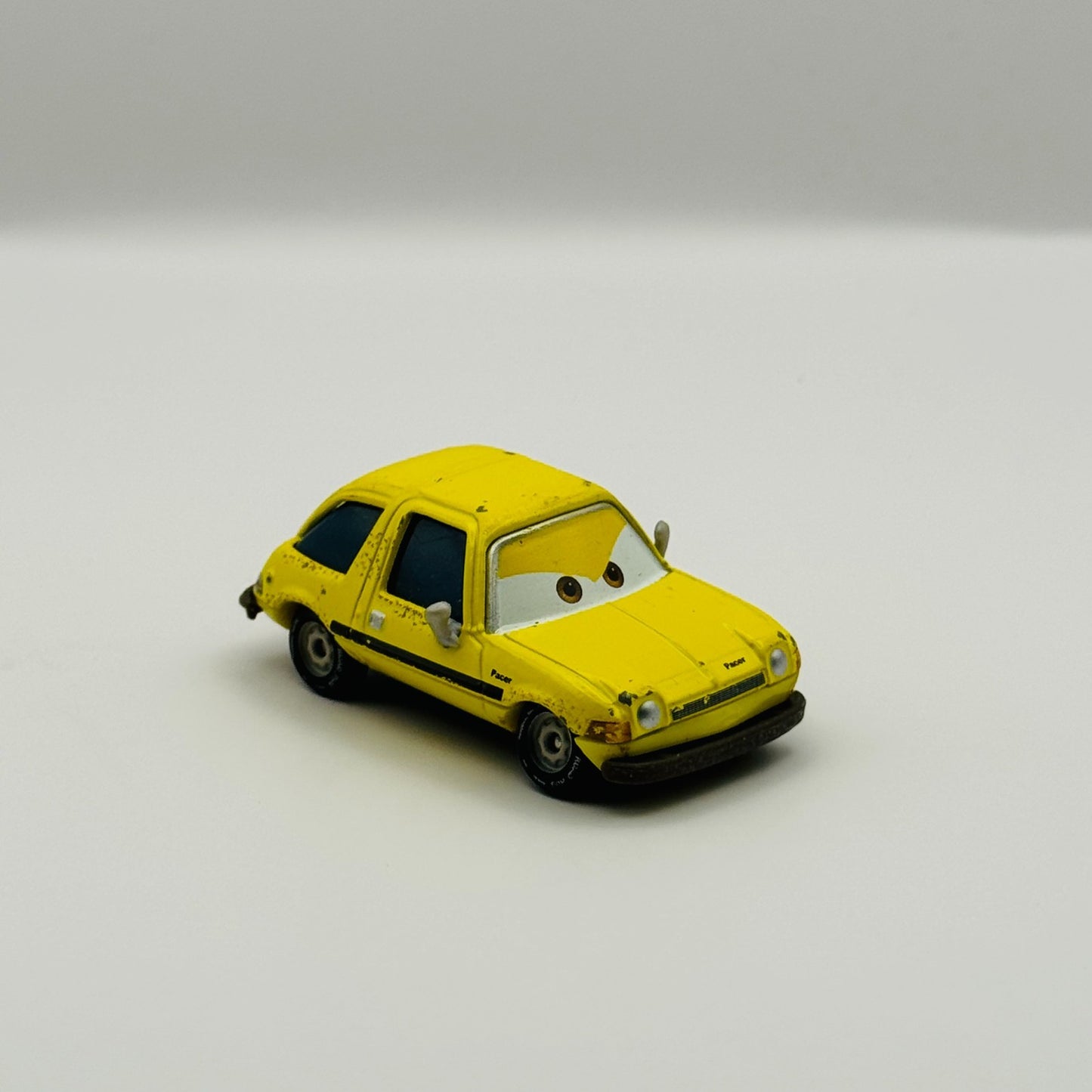 Disney Pixar Cars - FRED FISBOWSKI PACER YELLOW Lemons 2011 - 1:55 Diecast