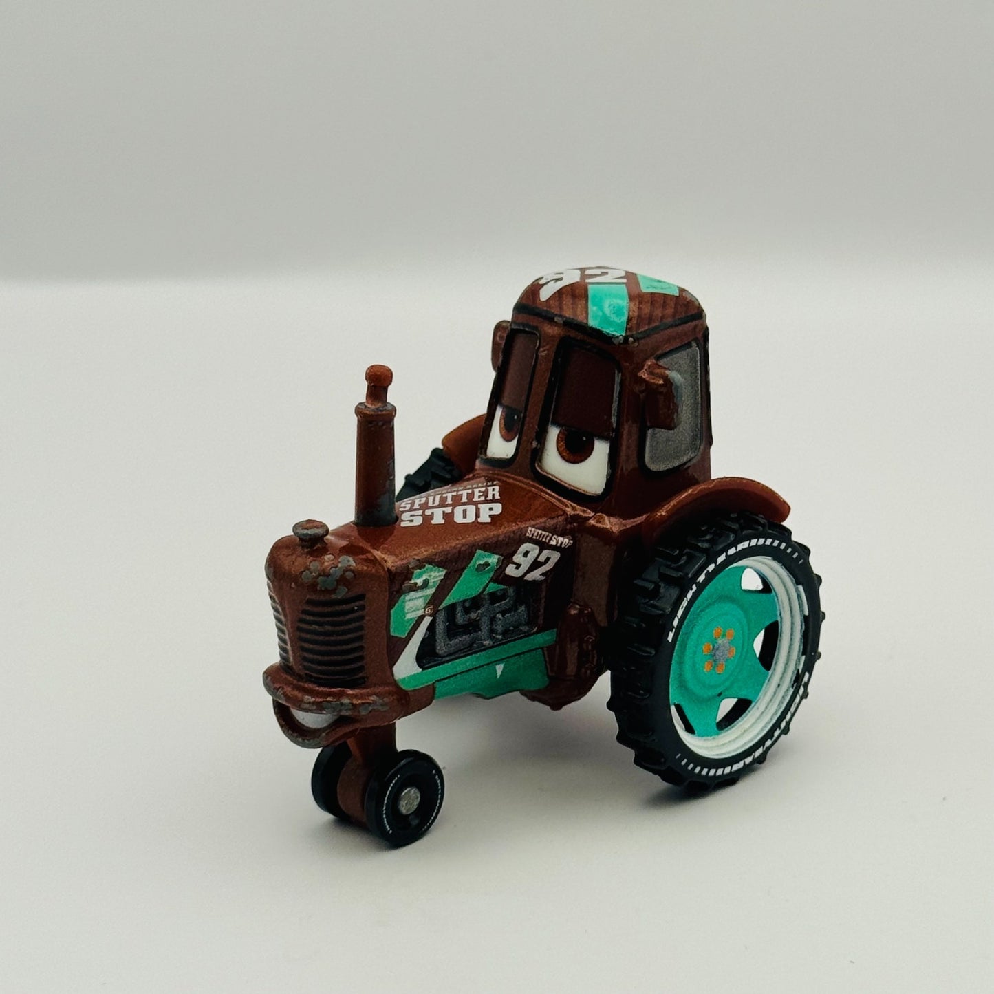 Disney Pixar Cars - SPUTTER STOP RACING TRACTOR 2021 - 1:55 Diecast