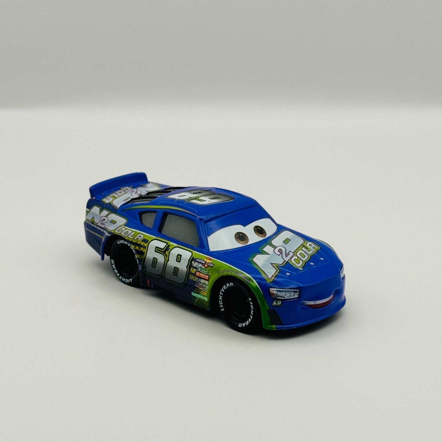 Disney Pixar Cars - PARKER BRAKESTON N2O COLA Veteran Racer 2017 - 1:55 Diecast