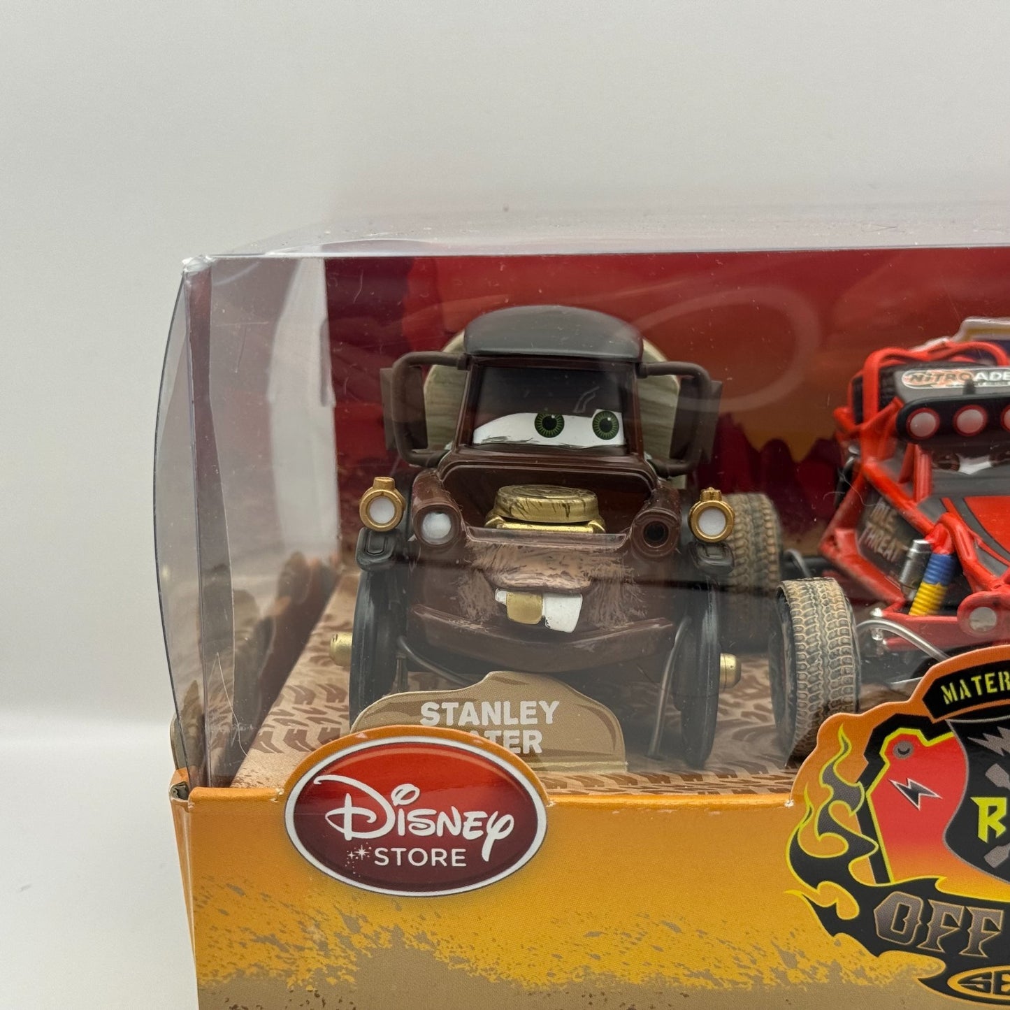 Disney Pixar Cars 500 1/2 OFF ROAD STANLEY DAYS MATER Disney Store -1:43 Diecast