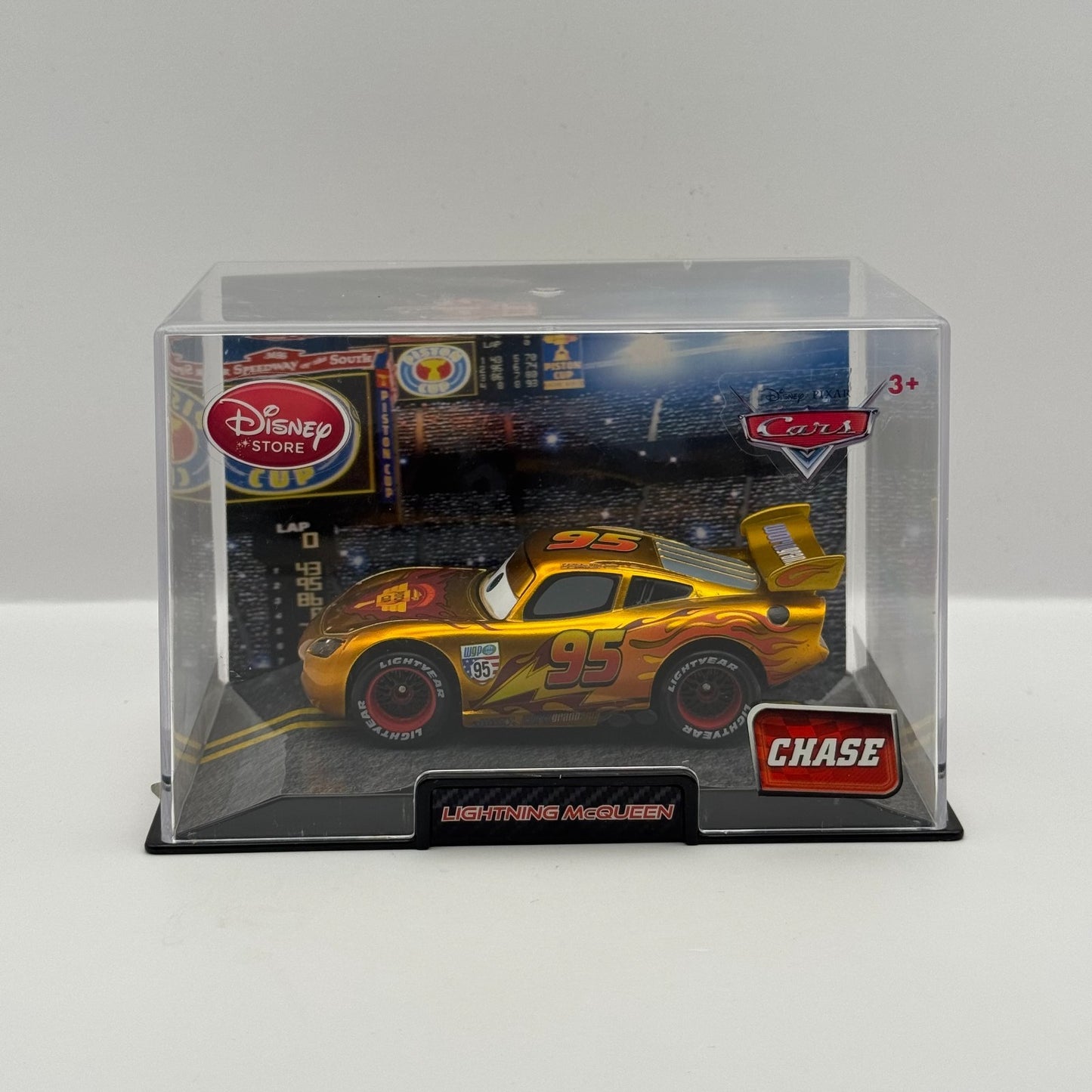 Disney Pixar Cars - GOLD WGP LIGHTNING MCQUEEN CHASE Disney Store - 1:43 Diecast