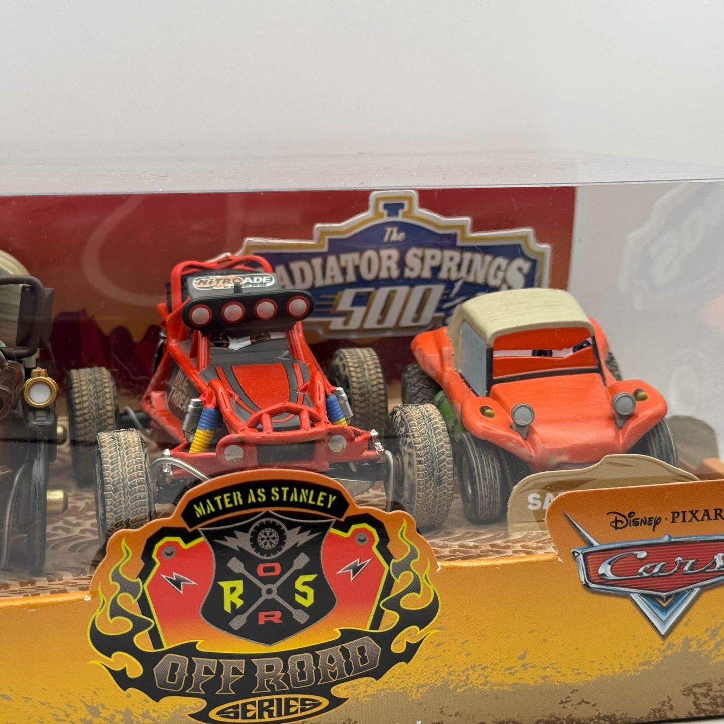 Disney Pixar Cars 500 1/2 OFF ROAD STANLEY DAYS MATER Disney Store -1:43 Diecast