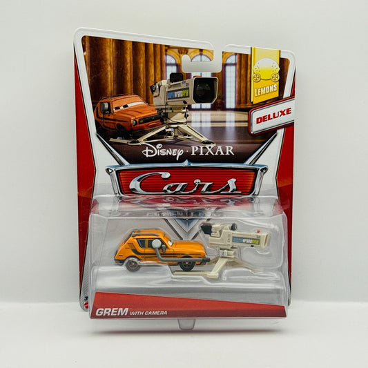 Disney Pixar Cars - GREM WITH CAMERA Deluxe Lemons 2014 - 1:55 Diecast