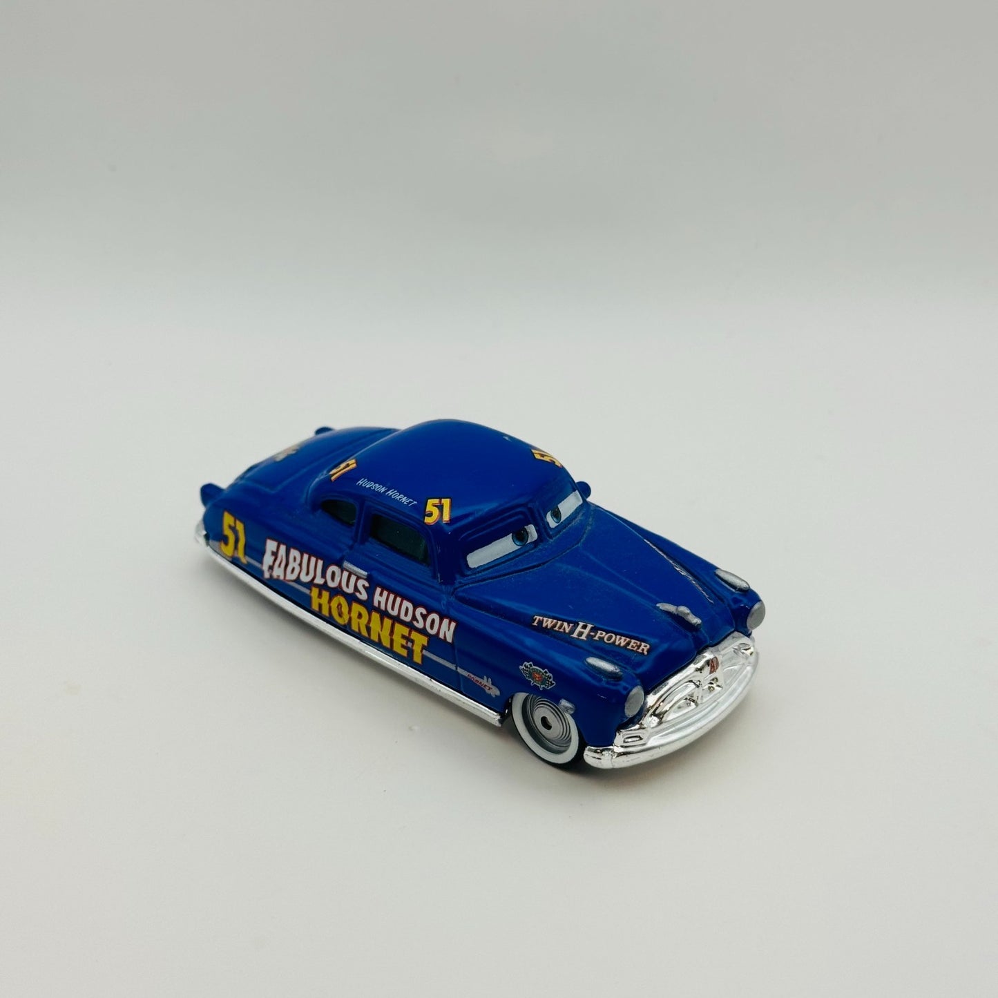 Disney Pixar Cars - FABULOUS HUDSON HORNET DOC WHITEWALLS 2007 - 1:55 Diecast