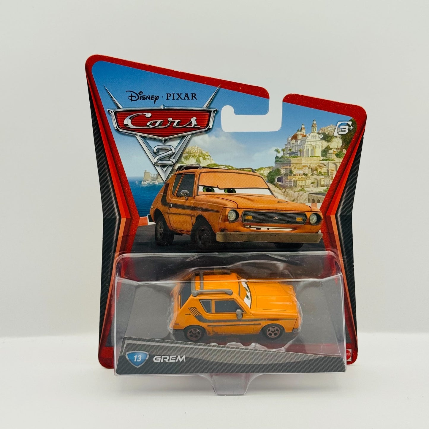 Disney Pixar Cars - GREM [AMC Gremlin] Cars 2 2011 - 1:55 Diecast