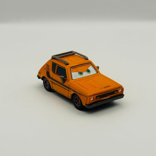 Disney Pixar Cars - GREM (AMC Gremlin) Lemons Cars 2 2011 - 1:55 Diecast