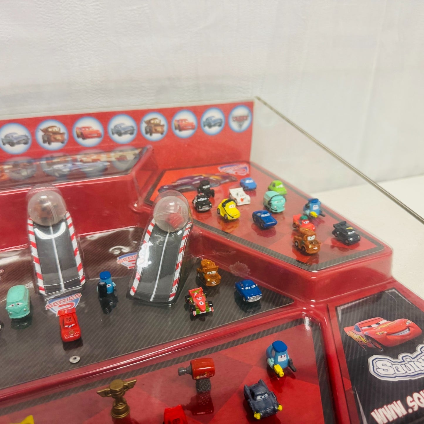 Disney Pixar Cars - CARS 2 SQUINKIES TARGET STORE DISPLAY IN GLASS CASE