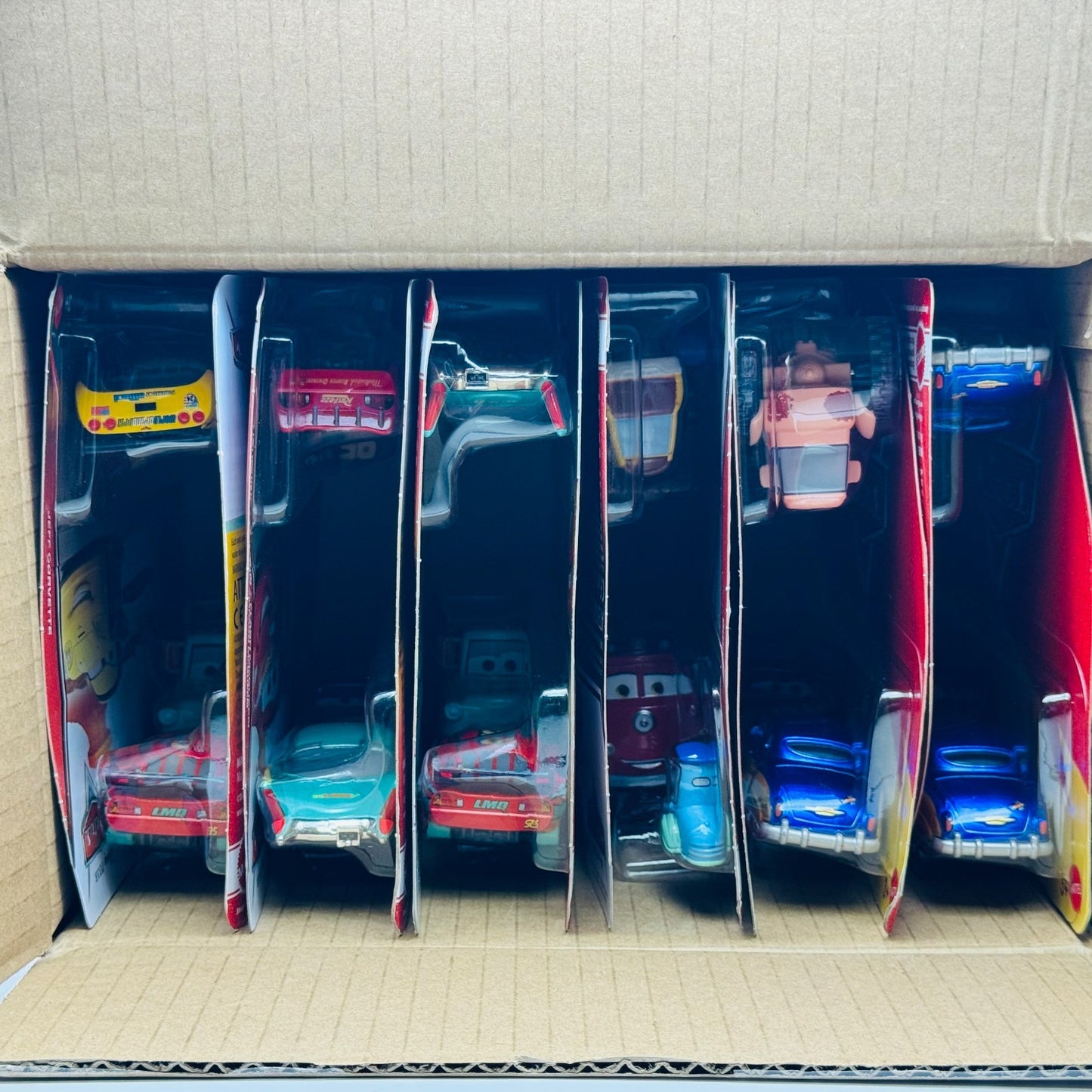 Disney Pixar Cars - 2026 CASE H 12 2PKS ANNIVERSARY DOC BUZZ WOODY -1:55 Diecast