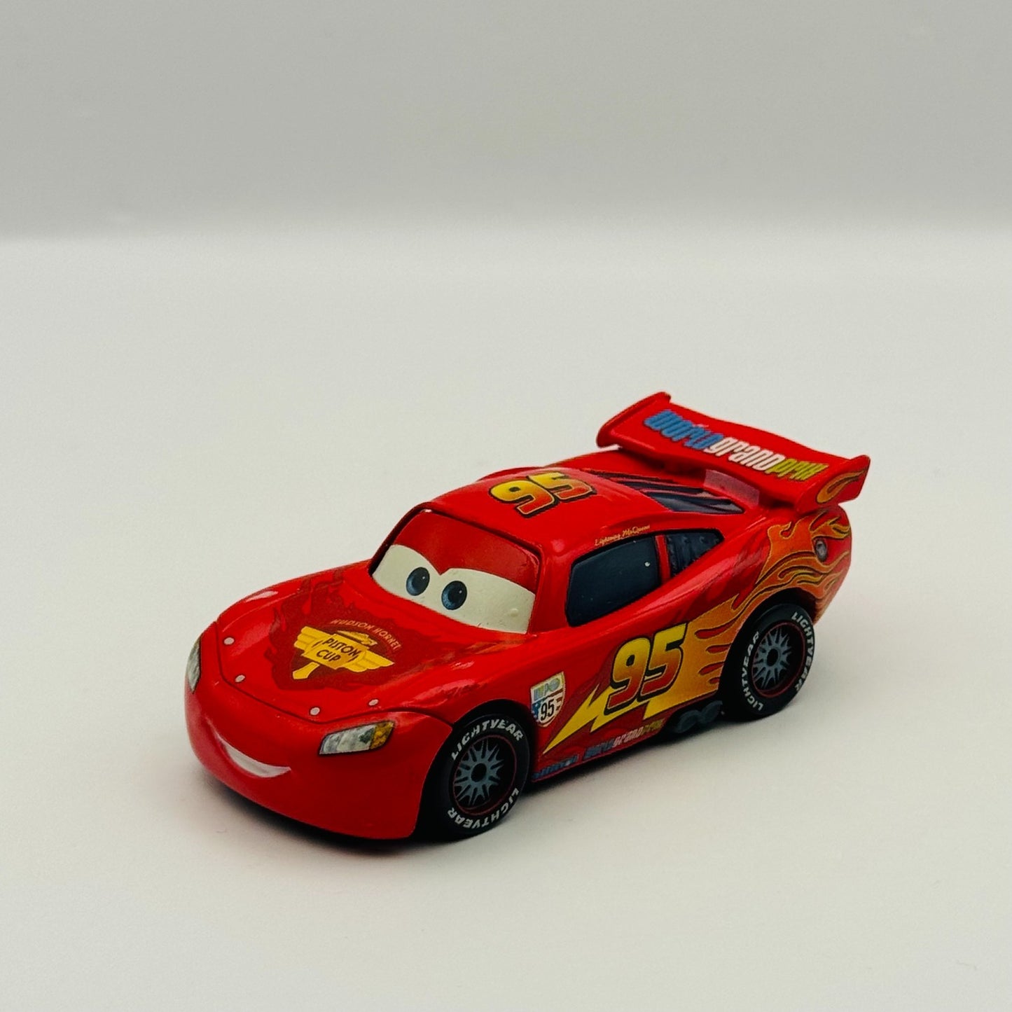 Disney Pixar Cars - WGP McQUEEN WITH RACING WHEELS Cars 2 2011 - 1:55 Diecast