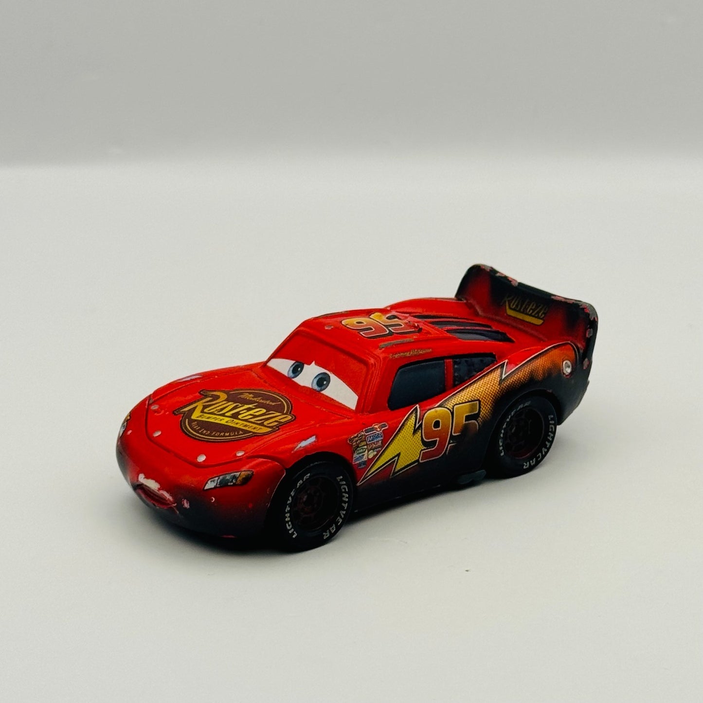 Disney Pixar Cars Toon BURNT LIGHTNING MCQUEEN Rescue Squad Mater - 1:55 Diecast