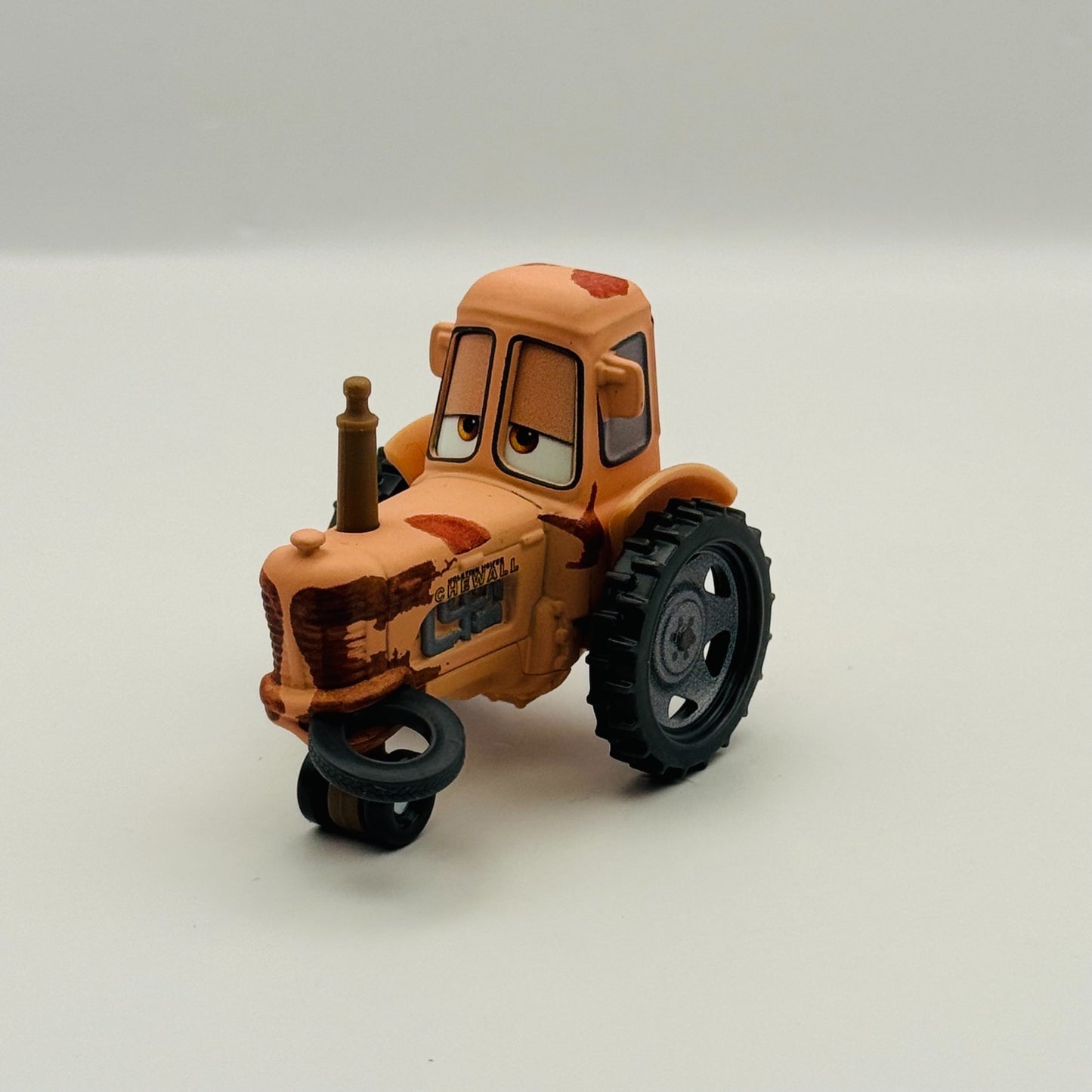 Disney Pixar Cars - CHEWALL TRACTOR WITH TIRE IN MOUTH 2026 - 1:55 Diecast