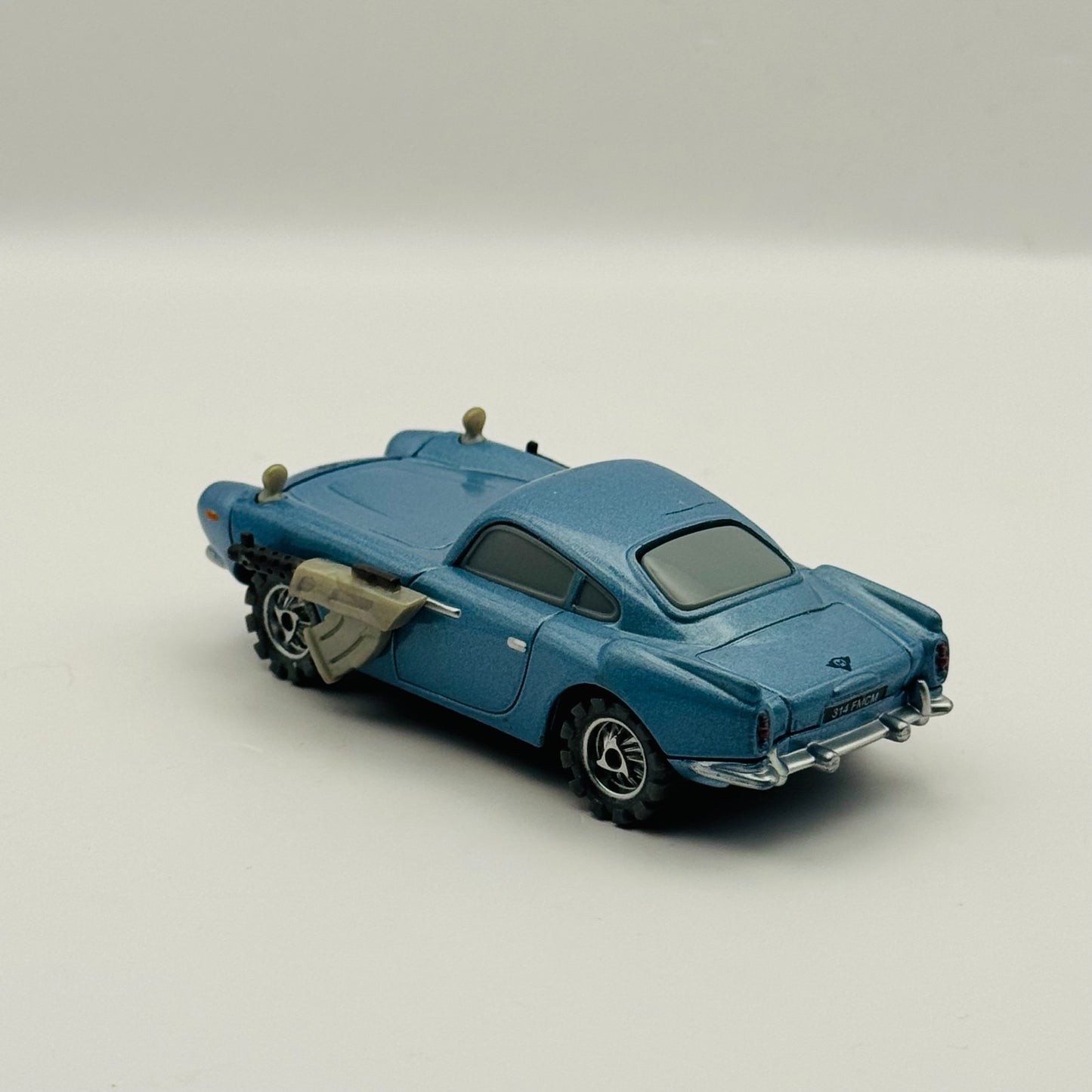 Disney Pixar Cars - LIGHTS & SOUNDS SPY FINN MCMISSILE WITH GUNS - 1:55 Diecast