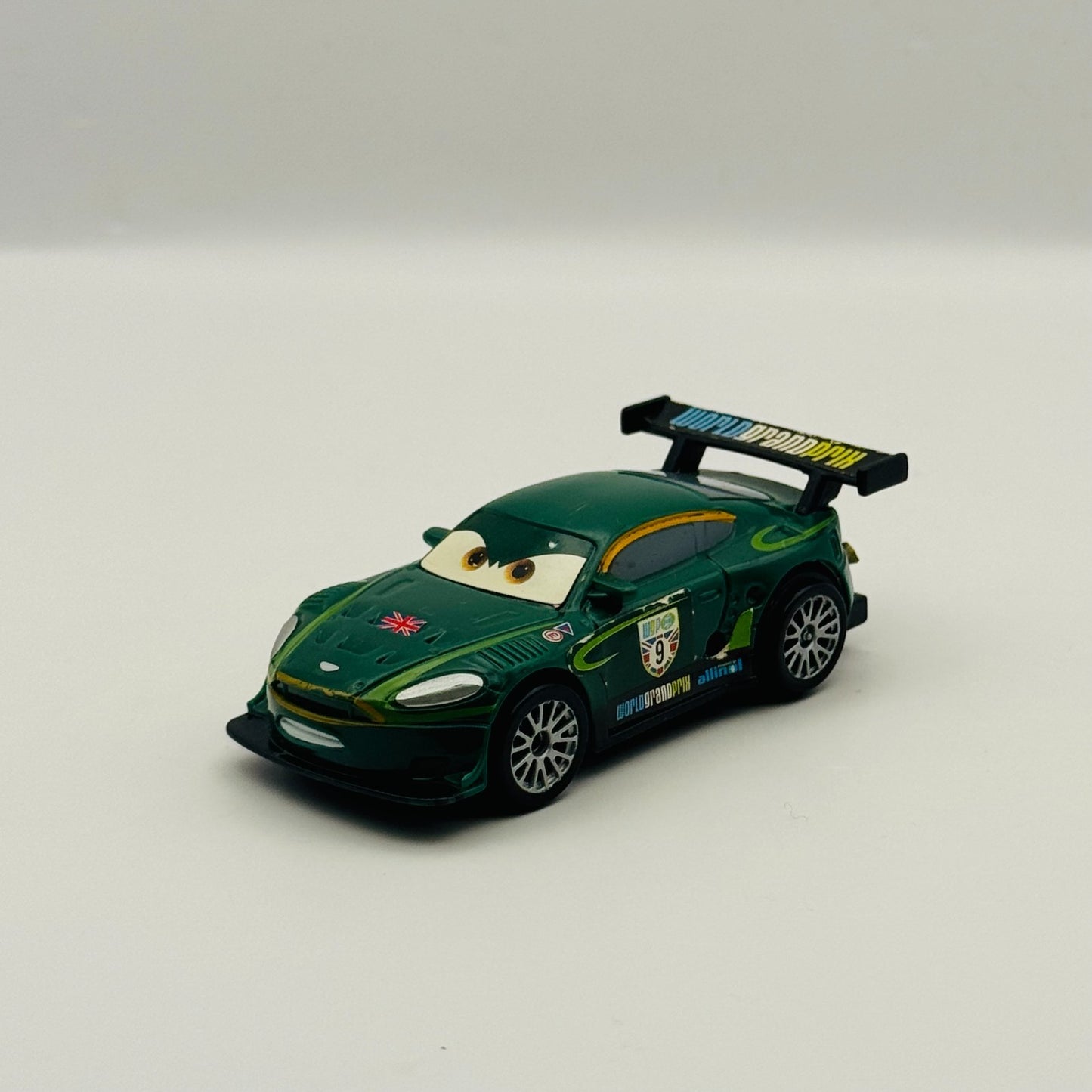 Disney Pixar Cars - CHARGE UPS NIGEL GEARSLEY WGP Cars 2 2011 - 1:55 Scale