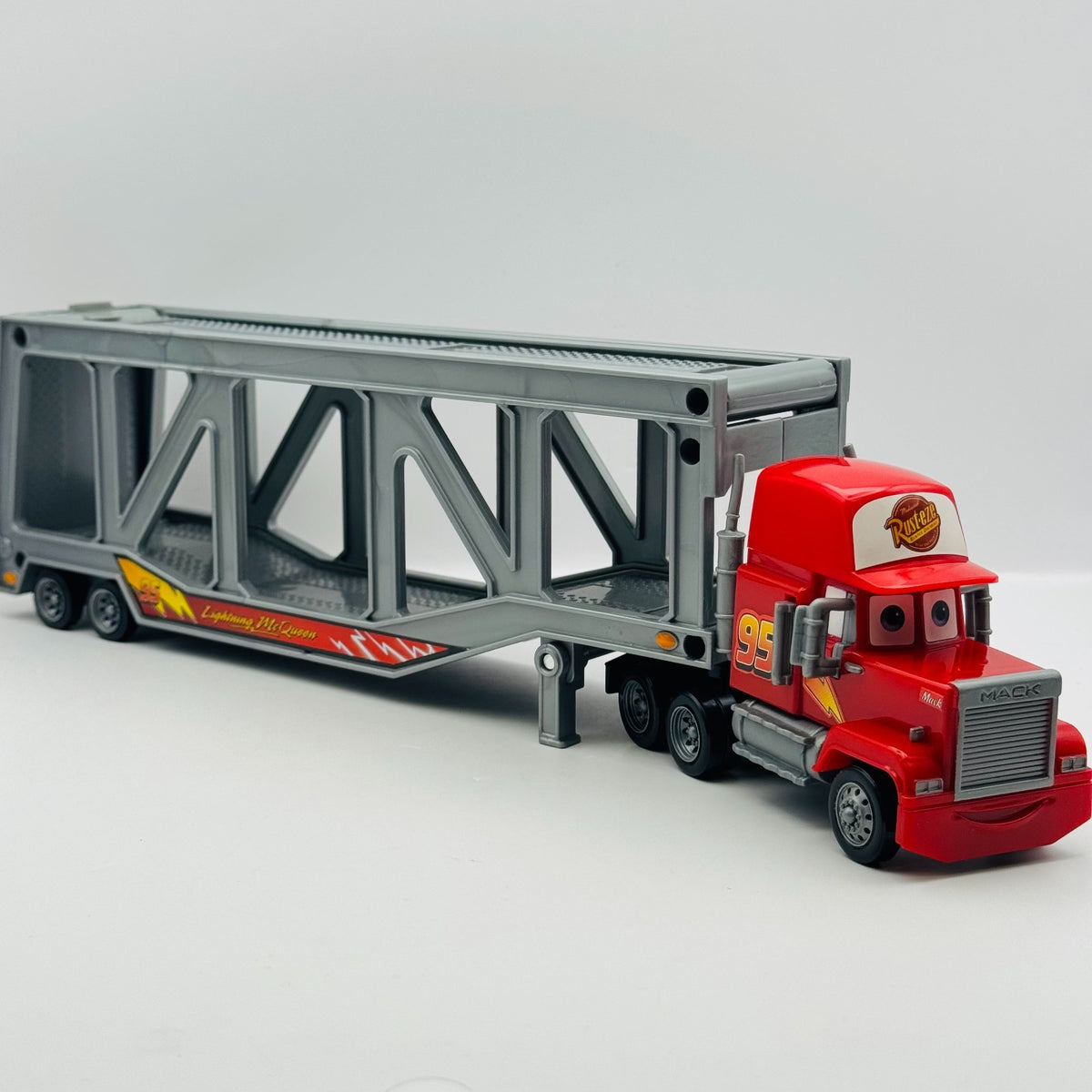 Disney Pixar Cars - MACK TRANSPORTER CAR CARRIER Supercharged 2007 - 1:55 Scale
