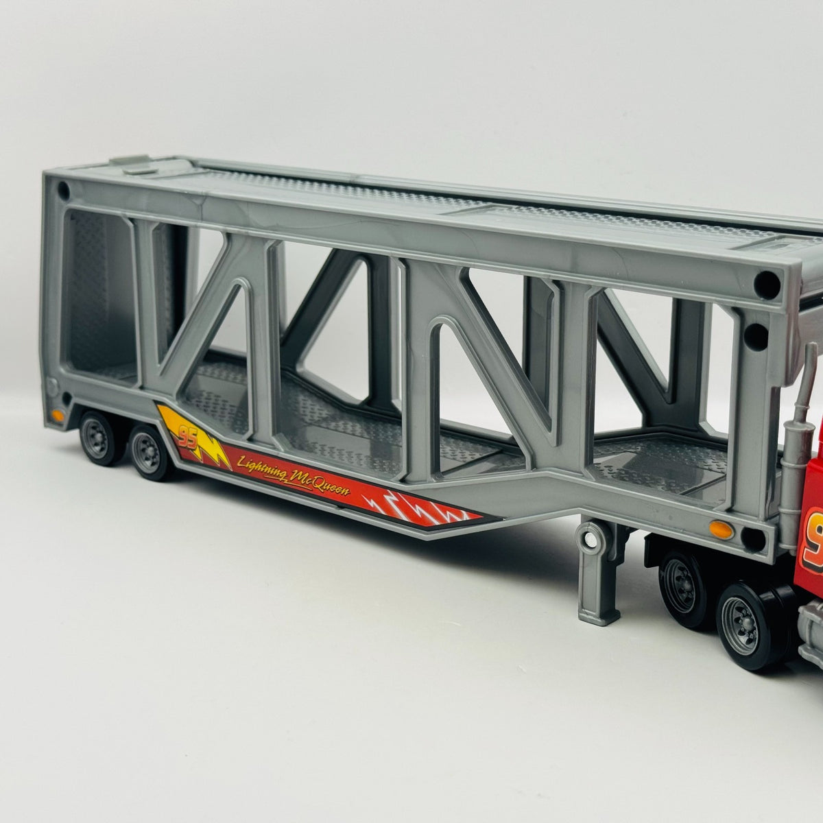 Disney Pixar Cars - MACK TRANSPORTER CAR CARRIER Supercharged 2007 - 1:55 Scale