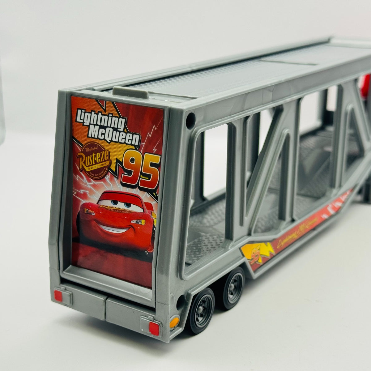 Disney Pixar Cars - MACK TRANSPORTER CAR CARRIER Supercharged 2007 - 1:55 Scale
