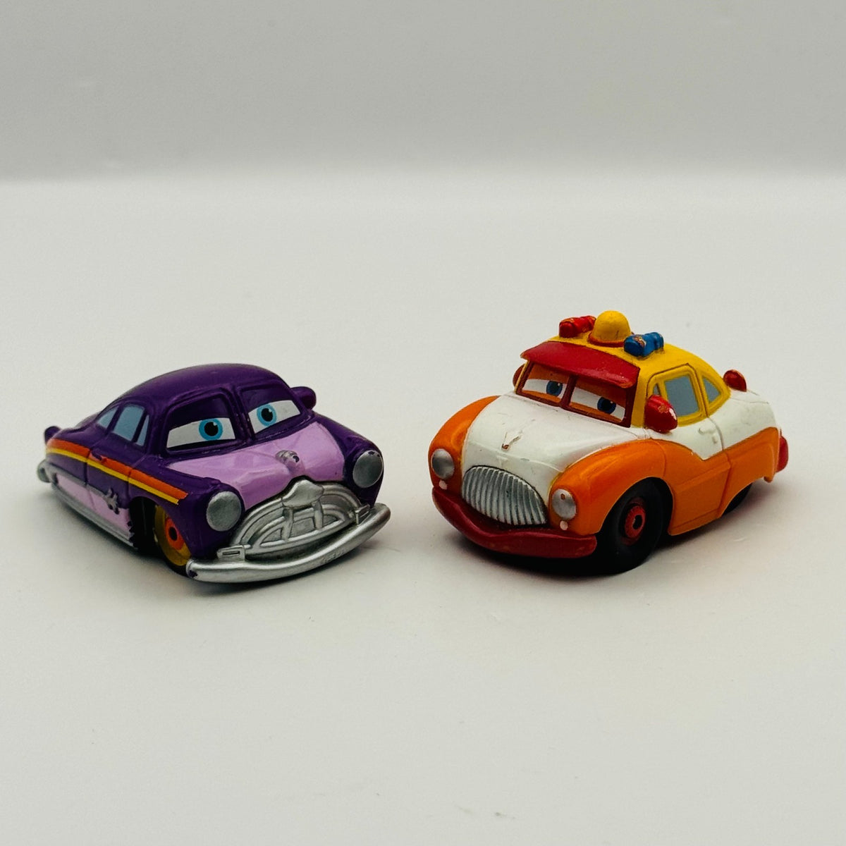 Disney Pixar Cars - Mini Adventures SHERIFF & PURPLE DOC - Fillmore's Festival