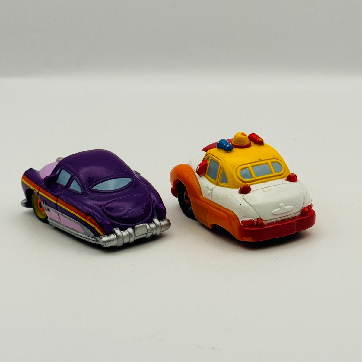 Disney Pixar Cars - Mini Adventures SHERIFF & PURPLE DOC - Fillmore's Festival