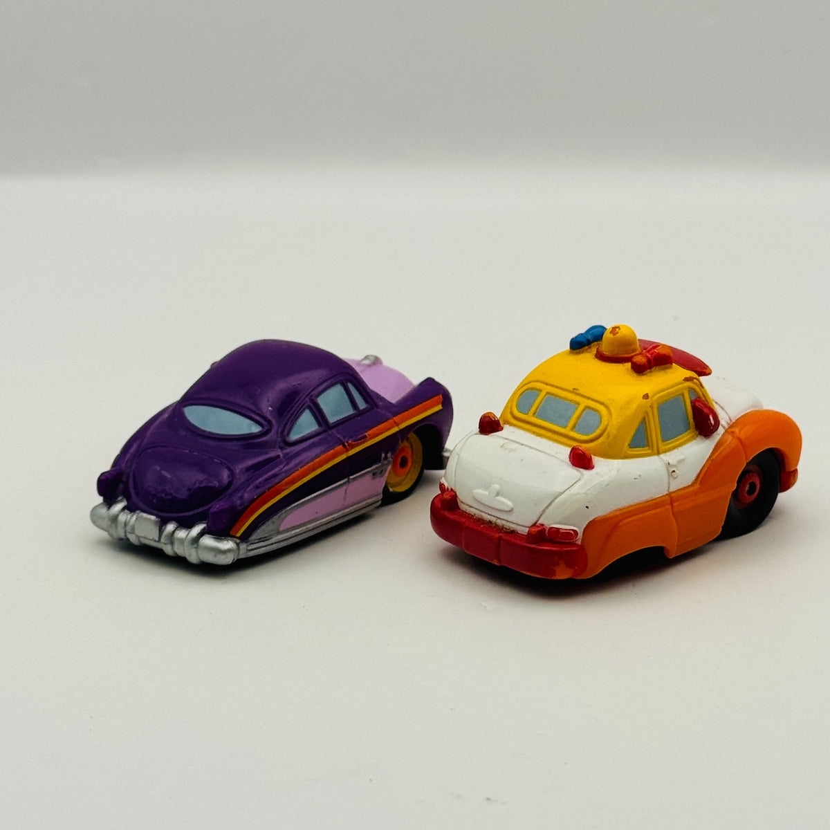Disney Pixar Cars - Mini Adventures SHERIFF & PURPLE DOC - Fillmore's Festival