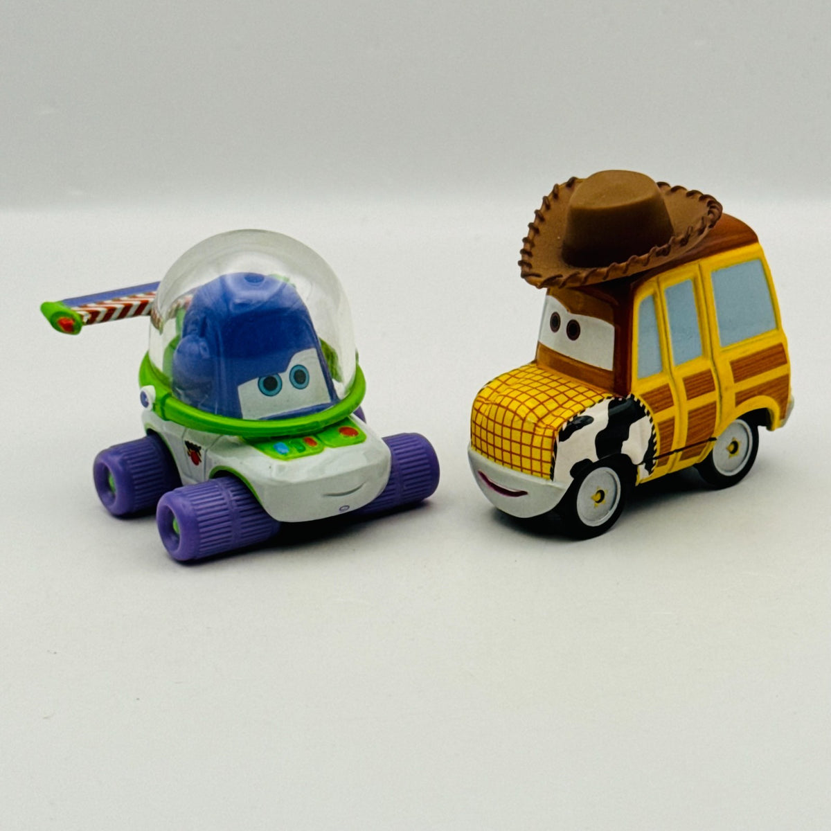 Disney Pixar Cars - BUZZ & WOODY Toy Story Supercharged 2007 - 1:55 Diecast