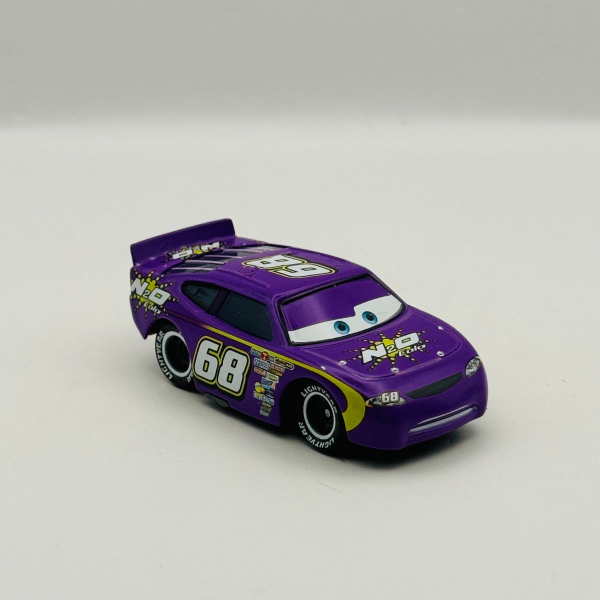 Disney Pixar Cars - N2O COLA MANNY FLYWHEEL Piston Cup - 1:55 Diecast