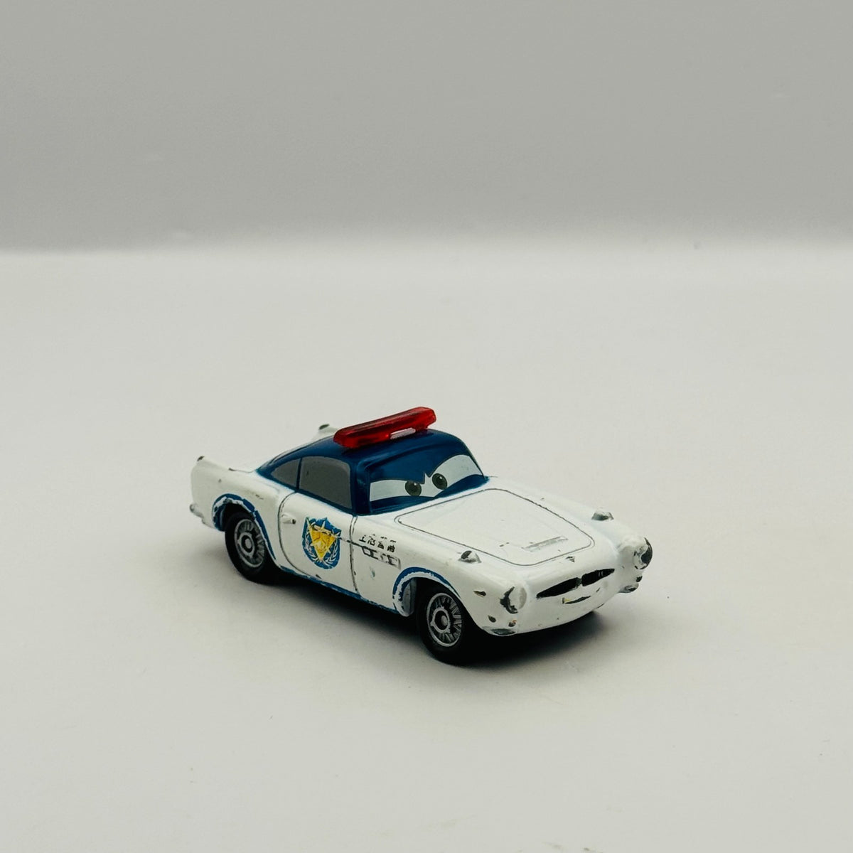 Disney Pixar Cars - Tomica AIRPORT SECURITY FINN MCMISSILE C-28 - 1:64 Diecast