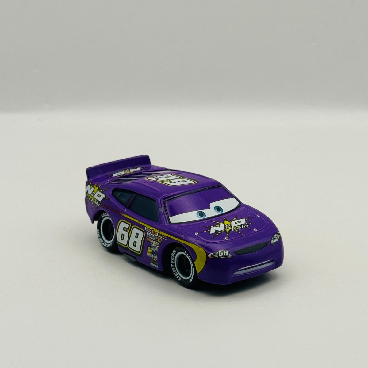 Disney Pixar Cars - N2O COLA MANNY FLYWHEEL Piston Cup - 1:55 Diecast