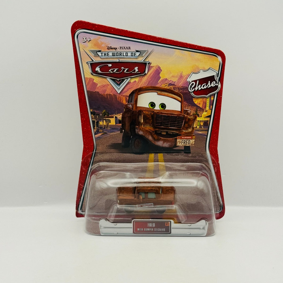 Disney Pixar Cars - FRED WITH BUMPER STICKERS World Of Cars 2008 - 1:55 Diecast