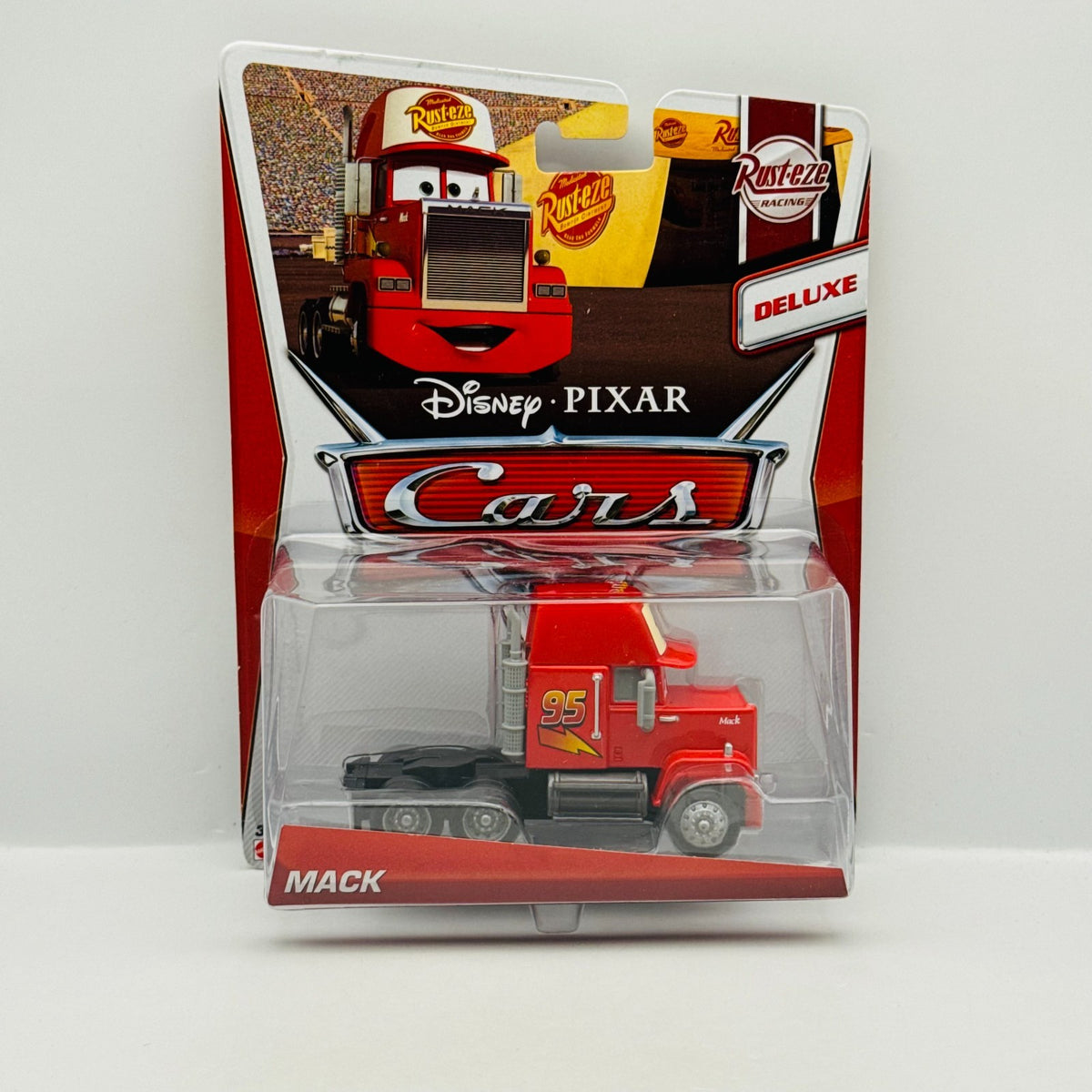 Disney Pixar Cars - MACK Semi Cab Hauler Deluxe Rusteze Racing 2013 1:55 Diecast