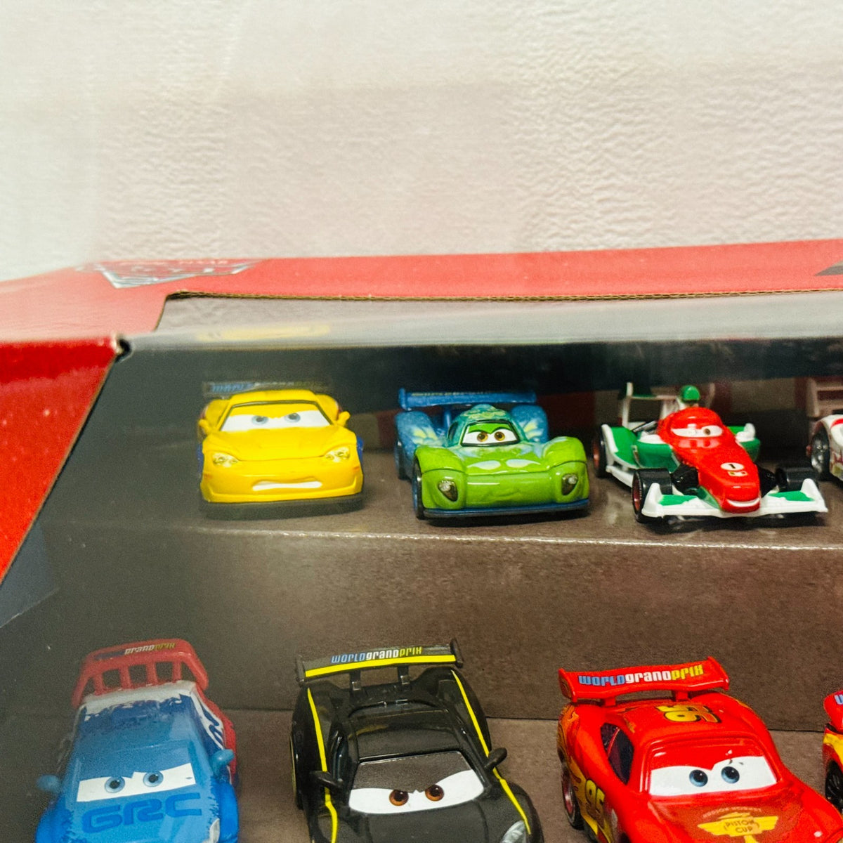 Disney Pixar Cars - WORLD GRAND PRIX RACERS 10-PK Cars 2 2012 - 1:55 Diecast