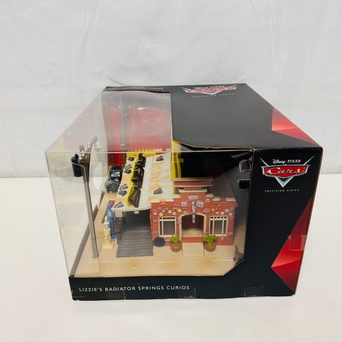 Disney Pixar Cars PRECISION SERIES LIZZIE'S RADIATOR SPRINGS CURIO 1:55 Diecast