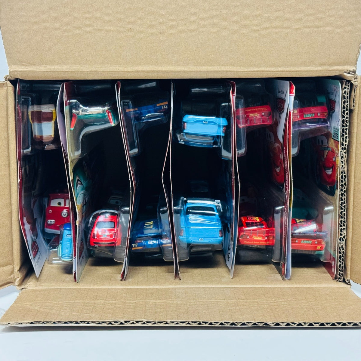 Disney Pixar Cars - 2026 CASE J 12 2PKS CELEBRATE RED BUZZ WOODY - 1:55 Diecast