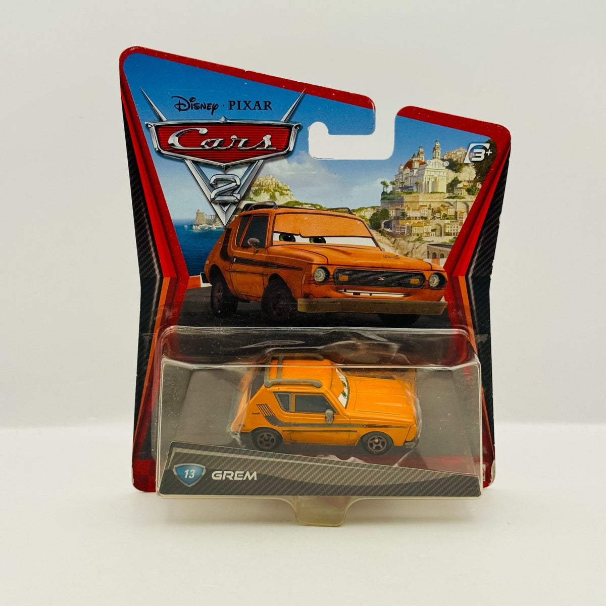 Disney Pixar Cars - GREM [AMC Gremlin] Cars 2 2011 - 1:55 Diecast